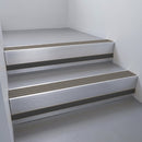 Mill Aluminium finish with Granite Castellated insert and Black Smooth Textured riser highlight - aluminium stair nosing 66x55mm fitted to a step edge