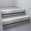 Mill Aluminium finish with Ivory Castellated insert and Black Smooth Textured riser highlight - aluminium stair nosing 66x55mm fitted to a step edge