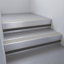Mill Aluminium finish with Light Grey Smooth Textured insert and Black Smooth Textured riser highlight - aluminium stair nosing 66x55mm fitted to a step edge