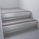 Mill Aluminium finish with Peat Castellated insert and Black Castellated riser highlight - aluminium stair nosing 66x55mm fitted to a step edge