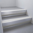 Mill Aluminium finish with Polar Grey Castellated insert and Black Castellated riser highlight - aluminium stair nosing 66x55mm fitted to a step edge