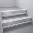 Mill Aluminium finish with Polar Grey Castellated insert and Light Grey Castellated riser highlight - aluminium stair nosing 66x55mm fitted to a step edge