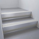 Mill Aluminium finish with Polar Grey Smooth Textured insert and Black Castellated riser highlight - aluminium stair nosing 66x55mm fitted to a step edge