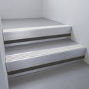 Mill Aluminium finish with Polished Aluminium insert and Black Smooth Textured riser highlight - aluminium stair nosing 66x55mm fitted to a step edge