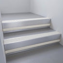 Mill Aluminium finish with Polished Aluminium insert and Light Grey Castellated riser highlight - aluminium stair nosing 66x55mm fitted to a step edge