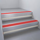 Mill Aluminium finish with Poppy Castellated insert and Light Grey Castellated riser highlight - aluminium stair nosing 66x55mm fitted to a step edge