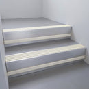 Mill Aluminium finish with Porth Stone Castellated insert and Light Grey Castellated riser highlight - aluminium stair nosing 66x55mm fitted to a step edge