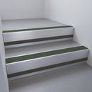 Mill Aluminium finish with Spruce Castellated insert and Black Smooth Textured riser highlight - aluminium stair nosing 66x55mm fitted to a step edge