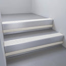 Mill Aluminium finish with White Castellated insert and Light Grey Castellated riser highlight - aluminium stair nosing 66x55mm fitted to a step edge