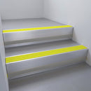 Mill Aluminium finish with Yellow Castellated insert and Black Castellated riser highlight - aluminium stair nosing 66x55mm fitted to a step edge