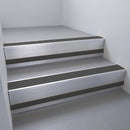 Satin Aluminium finish with Black Castellated insert and Black Smooth Textured riser highlight - aluminium stair nosing 66x55mm fitted to a step edge
