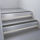 Satin Aluminium finish with Black Castellated insert and Light Grey Castellated riser highlight - aluminium stair nosing 66x55mm fitted to a step edge