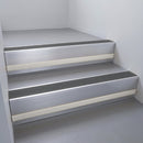 Satin Aluminium finish with Black Olympic Grip and Light Grey Castellated riser highlight - aluminium stair nosing 66x55mm fitted to a step edge