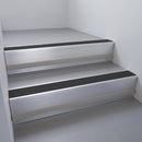 Satin Aluminium finish with Black Smooth Textured insert and Black Castellated riser highlight - aluminium stair nosing 66x55mm fitted to a step edge