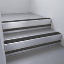 Satin Aluminium finish with Black Smooth Textured insert and Black Smooth Textured riser highlight - aluminium stair nosing 66x55mm fitted to a step edge