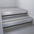Satin Aluminium finish with Flint Castellated insert and Black Smooth Textured riser highlight - aluminium stair nosing 66x55mm fitted to a step edge