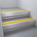 Satin Aluminium finish with Gold Castellated insert and Black Castellated riser highlight - aluminium stair nosing 66x55mm fitted to a step edge