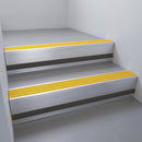 Satin Aluminium finish with Gold Castellated insert and Black Smooth Textured riser highlight - aluminium stair nosing 66x55mm fitted to a step edge