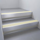Satin Aluminium finish with Ivory Castellated insert and Black Castellated riser highlight - aluminium stair nosing 66x55mm fitted to a step edge