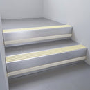 Satin Aluminium finish with Ivory Castellated insert and Light Grey Castellated riser highlight - aluminium stair nosing 66x55mm fitted to a step edge