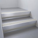 Satin Aluminium finish with Light Grey Castellated insert and Black Castellated riser highlight - aluminium stair nosing 66x55mm fitted to a step edge