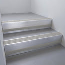 Satin Aluminium finish with Light Grey Smooth Textured insert and Black Castellated riser highlight - aluminium stair nosing 66x55mm fitted to a step edge