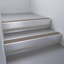 Satin Aluminium finish with Peat Castellated insert and Black Castellated riser highlight - aluminium stair nosing 66x55mm fitted to a step edge