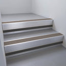 Satin Aluminium finish with Peat Castellated insert and Black Smooth Textured riser highlight - aluminium stair nosing 66x55mm fitted to a step edge