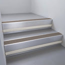 Satin Aluminium finish with Peat Castellated insert and Light Grey Castellated riser highlight - aluminium stair nosing 66x55mm fitted to a step edge