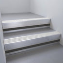 Satin Aluminium finish with Polished Aluminium insert and Black Smooth Textured riser highlight - aluminium stair nosing 66x55mm fitted to a step edge