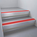Satin Aluminium finish with Poppy Castellated insert and Black Castellated riser highlight - aluminium stair nosing 66x55mm fitted to a step edge