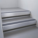 Satin Aluminium finish with Regency Castellated insert and Black Smooth Textured riser highlight - aluminium stair nosing 66x55mm fitted to a step edge