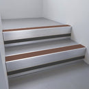 Satin Aluminium finish with Rustic Castellated insert and Black Smooth Textured riser highlight - aluminium stair nosing 66x55mm fitted to a step edge