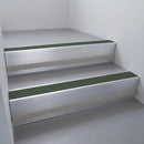 Satin Aluminium finish with Spruce Castellated insert and Black Castellated riser highlight - aluminium stair nosing 66x55mm fitted to a step edge