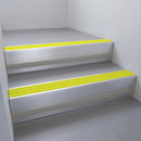 Satin Aluminium finish with Yellow Castellated insert and Black Castellated riser highlight - aluminium stair nosing 66x55mm fitted to a step edge