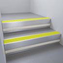 Satin Aluminium finish with Yellow Castellated insert and Light Grey Castellated riser highlight - aluminium stair nosing 66x55mm fitted to a step edge