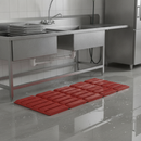 Red anti-slip wet area matting laid in front of a commercial kitchen wash-down area