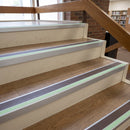 72x55mm aluminium stair nosing with a brown PVC insert and green photoluminescent strip fitted to library stairs