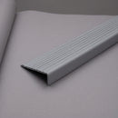Grey PVC stair nosing 40mm x 25mm shown alone on a plain studio background, ribbed tread face and front face visible