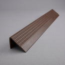 Brown PVC stair nosing 50mm x 42mm shown alone on a plain studio background, ribbed tread face and full-depth front face visible