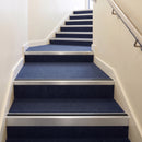 Heavy Duty Rake Back Aluminium Stair Nosing 2.44m, 62 x 56 in Satin Silver finish fitted on a commercial stair