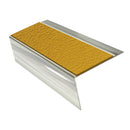 Bright Polished rake back DDA aluminium stair nosing 70 x 56mm with Solar yellow High Grip insert, studio view showing the raked leg and ramped back