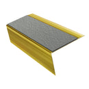 Mirrorflect Gold rake back DDA aluminium stair nosing 70 x 56mm with Everest light grey Exterior Grip insert, studio view showing the raked leg and ramped back