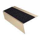 Satin Bronze rake back DDA aluminium stair nosing 70 x 56mm with Coal black Exterior Grip insert, studio view showing the raked leg and ramped back