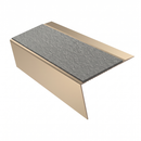 Satin Bronze rake back DDA aluminium stair nosing 70 x 56mm with Everest light grey Exterior Grip insert, studio view showing the raked leg and ramped back