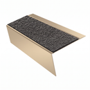 Satin Bronze rake back DDA aluminium stair nosing 70 x 56mm with Obsidian black High Grip insert, studio view showing the raked leg and ramped back