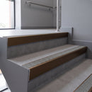 Aluminium rake back stair nosing 56 x 56mm, Everest Exterior Grip insert, Dark Bronze finish, fitted to concrete steps