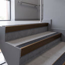 Aluminium rake back stair nosing 56 x 56mm, Obsidian Mor Grip insert, Dark Bronze finish, fitted to concrete steps