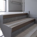 Aluminium rake back stair nosing 56 x 56mm, Everest Exterior Grip insert, Satin Bronze finish, fitted to concrete steps