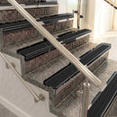 Raked back aluminium stair nosing, black anodised with black anodised aluminium insert